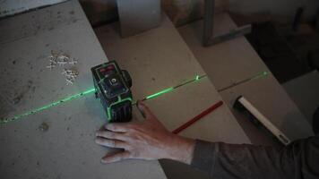 Ceramic tile installation using a laser level video