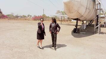 Managers Discussing beside Abandoned Aeroplane video