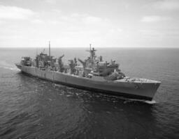 Navy Battle Ship With Guns and Other Weapons Background photo