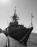 Navy Battle Ship With Guns and Other Weapons Background photo