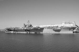 Navy Battle Ship With Guns and Other Weapons Background photo
