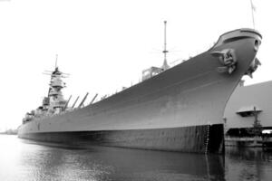 Navy Battle Ship With Guns and Other Weapons Background photo