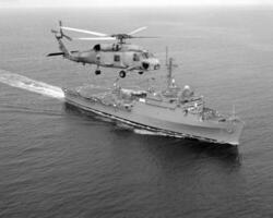 Navy Battle Ship With Guns and Other Weapons Background photo
