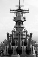 Navy Battle Ship With Guns and Other Weapons Background photo