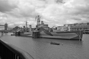 Navy Battle Ship With Guns and Other Weapons Background photo