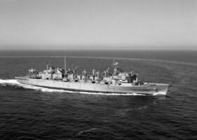 Navy Battle Ship With Guns and Other Weapons Background photo