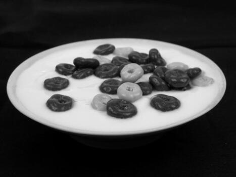 Dried Apricot Kernels and Almonds on Tableware photo