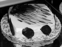 Decorated Cake on Elegant Dishware photo