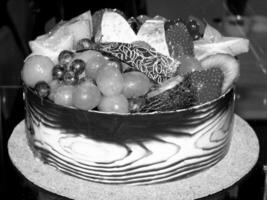 Fresh Fruits and Tableware Arrangement with Strawberries photo