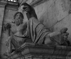 Sculpture close view background. Monument art. Black and white monochrome grayscale photo