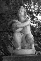 Sculpture close view background. Monument art. Black and white monochrome grayscale photo