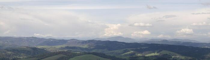 Landscape with mountains and clouds photo