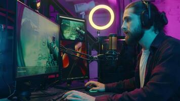 Caucasian gamer man addict puzzled influencer streaming play videogame blog computer screen surprise confused male guy blogger removing headphones shock scam losing game cheat e-sport problem at home video