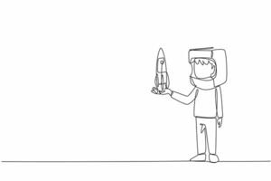 Single continuous line drawing boy holding cardboard rocket wearing cardboard helmet. Resembling spaceman. Dreams that must come true. Big dreams. Cosmonautics Day. One line design illustration vector