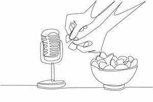 Single one line drawing hand plucks round potato chip and directs it towards the mic. A sound that stimulates appetite. Hungry. International ASMR Day. Continuous line design graphic illustration vector