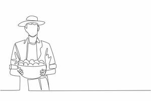 Single continuous line drawing a man wearing a hat carrying a container full of tomatoes. Bringing a satisfying harvest. Tomato farmer. Vitamin. Fresh Tomato Day. One line design illustration vector