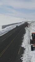 Snow Machines Plow The Road video
