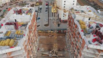 Aerial view of the construction site of two residential buildings in a new area. video