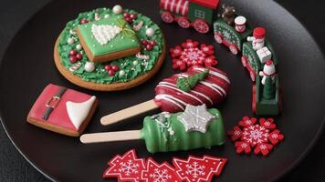 Natural popsicle ice cream on a stick covered with chocolate in the style and colors of Christmas and New Year on a dark concrete background video