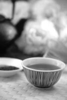 Elegant Tableware Display Featuring Dishware, Drinkware, and Tea-Serving Ingredients for Culinary Presentation photo