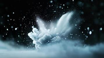 Dramatic explosion of white dust creating dynamic patterns in a dark environment photo