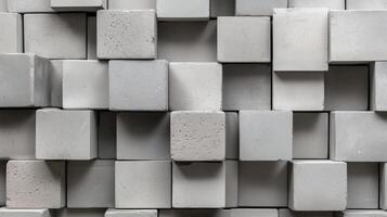 Abstract arrangement of gray concrete cubes showcasing texture and pattern in a contemporary setting photo