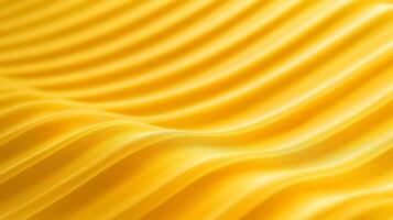 Beautiful waves of vibrant yellow fabric create an elegant and dynamic visual effect in soft lighting photo
