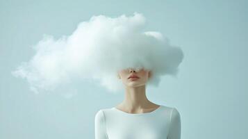 Woman with cloud covering her head in a surreal artistic representation of thoughts and imagination photo