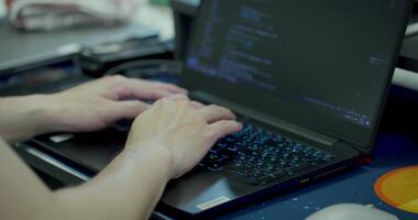 man working on laptop, hands of businessman typing on keyboard. video
