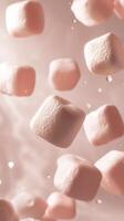 Soft pink marshmallows float in the air against a dreamy background during a sweet culinary creation process photo