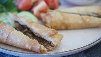 Savory Crispy Pastry Rolls with Fresh Vegetables and Dipping Sauce video