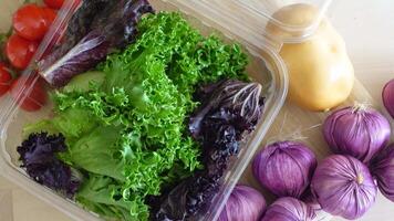 Vibrant Lettuce, Crisp Onions, and Nutritious Potato on White Background video