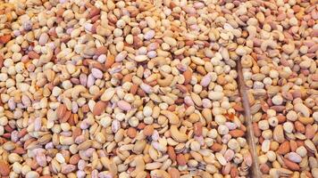 A Diverse Assortment of Raw Nuts and Seeds on Display at the Market video