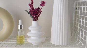Modern Still Life With Vase, Aromatherapy Oil, and Minimal Decor video