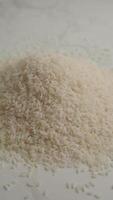 A CloseUp Image Showing White Rice Grains Neatly Arranged in a Pile video