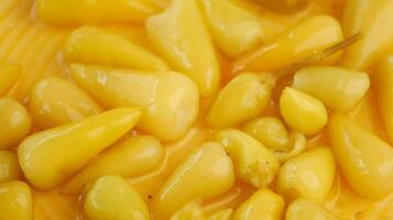 Top View of Pickled Vegetables in a Yellow Ceramic Bowl on Table video
