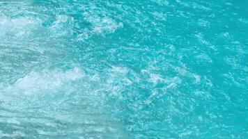 Jacuzzi. Top view. Bubbling water in the open jacuzzi, pool. Tropical resort, by the sea. Air bubbles released in jacuzzi spa creating perfect relaxing treatment for well being. Background, no people video