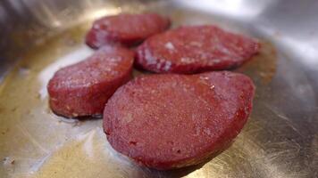 The Cooking Process of Sliced Meat in a Skillet, step by step guide video
