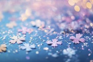 Delicate pink snowflakes scattered across a shimmering blue surface creating a magical winter wonderland atmosphere photo