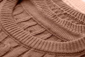 Mocha Mousse - color of the year 2025. texture of autumn warm sweater photo
