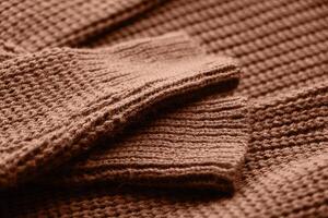Mocha Mousse - color of the year 2025. texture of autumn warm sweater photo