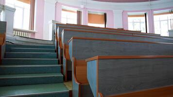 Empty seats in university classroom. Empty lecture hall with large amount of seats video