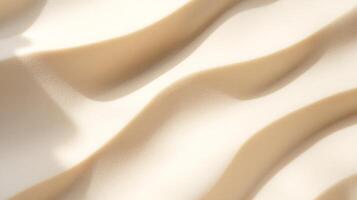 Smooth sand dunes casting gentle shadows in minimalist desert landscape photo