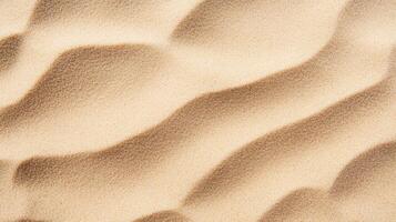 Smooth sand dunes with gentle shadows create serene pattern photo