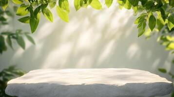 sunlit stone podium surrounded by lush green leaves creates serene and natural setting photo