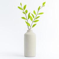 Minimalist vase with green leaves, perfect for home decor and interior styling. This elegant design adds touch of nature to any space, enhancing ambiance beautifully photo