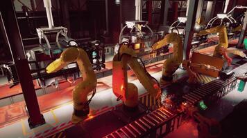 Robotic arms operating on the conveyor belt in a factory during daytime video