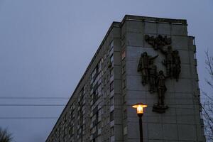 Grey, Soviet panels in the distance in the evening. Minsk in the evening photo