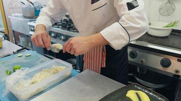 Preparation Of Second Course Food With Sliced Potatoes And Fish In Restaurant video