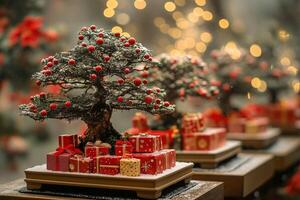 Miniature bonsai tree decorated for christmas with red berries and gifts photo